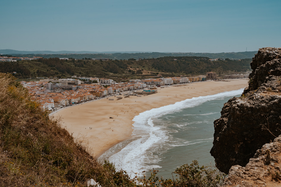 overlooking the expansive white sand Nazare beach from a hilltop