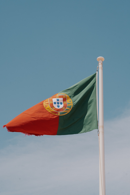 Portuguese Flag flaps in the wind on a sunny day