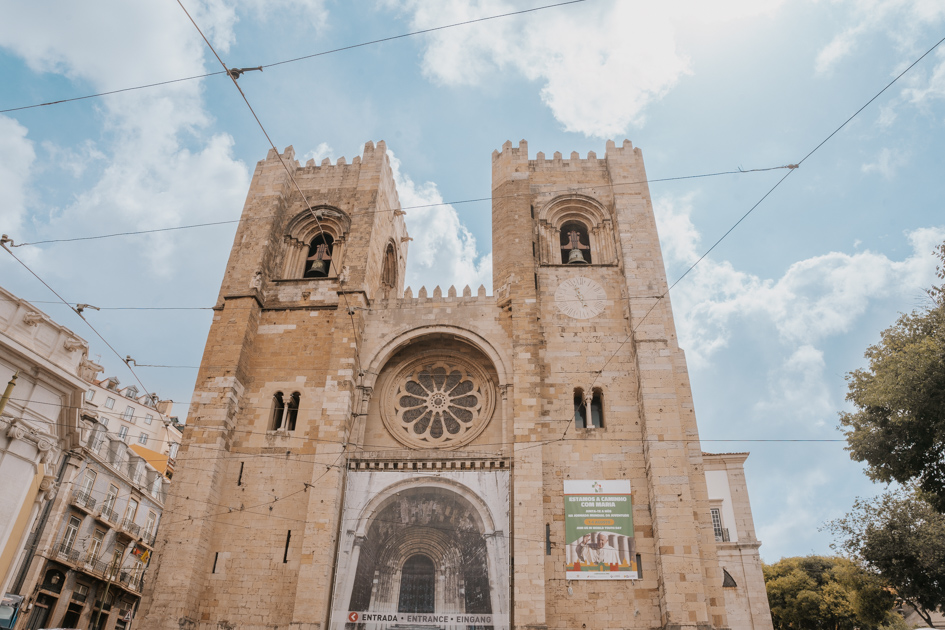 two square towers adorn a gothic cathedral in Alfama neighbourhood Lisbon